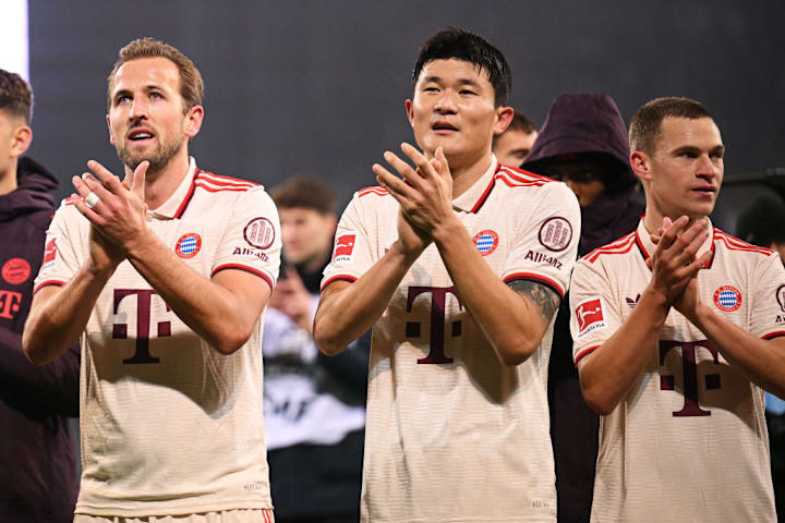 Harry Kane and Kim Min-jae celebrate Bayern's win over St Paul