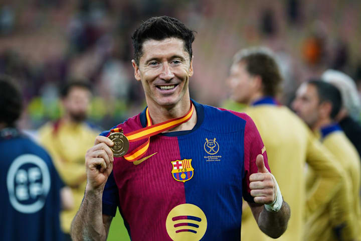 Robert Lewandowski celebrates as Barcelona wins the Spanish Super Cup